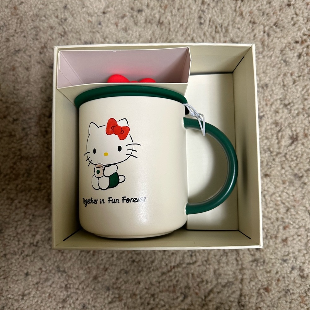 Starbucks Hello Kitty Mug with Green Handle